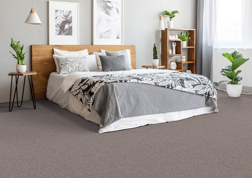 Berber carpet in a sleek, modern bedroom in soft neutrals. 